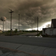 Storm looming over the real-life ghost town. The former pharmacy to the right of Gary Linderman.